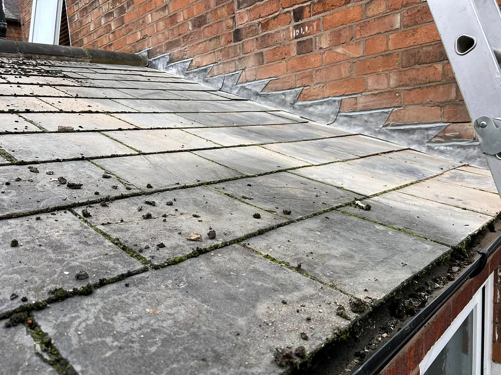 Lead flashing on a slate roof